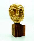 Verguld terracotta sculptuurtje in de vorm van een mannenkop op een palisander sokkeltje ontwerp uitvoering Hildo Krop 1930-'50 
