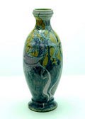 Aardewerk vaas mod.189 met polychrome decoratie van draken en distels in okergeel en donker- licht-lila glazuur ontwerp J.W.Mijnlieff uitvoering Faience Tegelfabriek Holland Utrecht ca.1900 