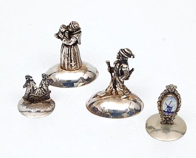  Four silverplated metal miniatures design execution unknown 