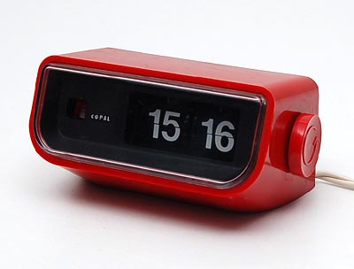  Red plastic clock with flipping numbers executed by Copal / Japan 1967 