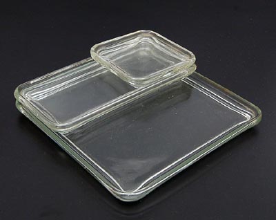  Three clear glass covers of the Kubus-Geschirr design Wilhelm Wagenfeld 1938 executed by VLG Vereinigte Lausitzer Glaswerke Weiszwasser / Germany 