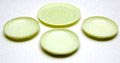  Yellow colopal saucers and a small plate executed by Glasfabriek Leerdam ca.1935 