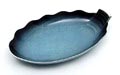  Oval blue-grey enamelled earthenware servingdish executed by Carlton Ware / England ca.1935 