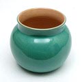  Green glazed earthenware vase executed by Plateelbakkerij Zuid-Holland the Netherlands ca.1950 