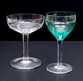  One champagne-coupe and one green white-wineglass Spectrum design W.J.Rozendaal 1929 executed by Kristalunie Maastricht / the Netherlands 