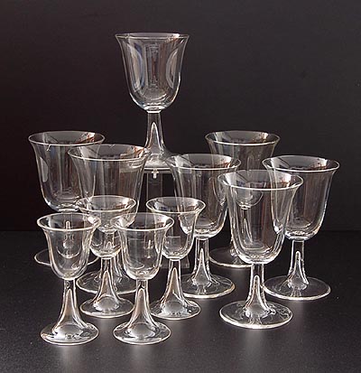 Clear glasses Cordeal-a-like whitewine- 3x high 12,1 cm redwine- 4x high 12,6 cm shotglasses 4x high 9,4 cm design attributed to Gerard Muller Amsterdam / the Netherlands ca.1915 executed by Josephinenhütte Schreiberhau / Bohemia 
