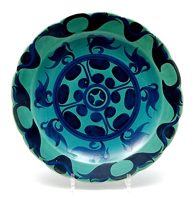 Green glazed earthenware wall-plate with decor Bizrra in blue glaze design W.J.Rozendaal 1925 executed by de Sphinx Maastricht / the Netherlands 