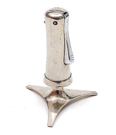 Chromium plated table-lighter on triangle stand design executed by Ronson / England ca.1950 