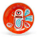 Earthenware plate with coloured decoration in orange red green brown design executed by Desimone / Italy ca.1960 