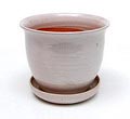 Glazed earthenware flowerpot on stand executed by N.V.de Rijn Leiderdorp / the Netherlands ca.1925 