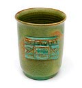 Green glazed earthenware jug with decoration Berg en Dal design executed by W.C.Brouwer the Netherlands ca.1930 