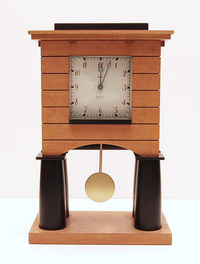 Wooden and plastic electric mantle clock design Michael Graves 1988 executed by Alessi / Italy Comes with original box 