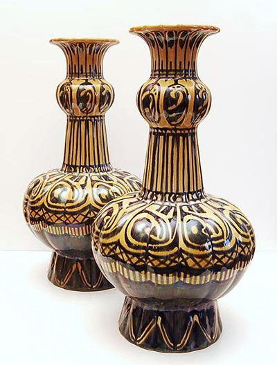 Two knobbelvazen / Dorna with lustre glaze executed by Plateelbakkerij Delft PBD December 1909 
