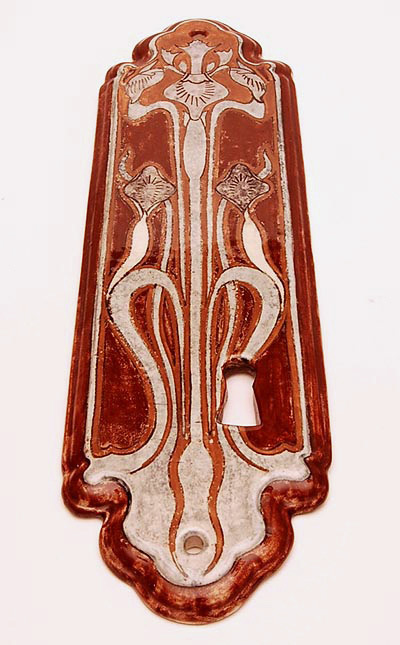 Polychrome earthenware doorplate with keyhole design J.W.Mijnlief executed by Holland-Utrecht the Netherlands 1893/1920 