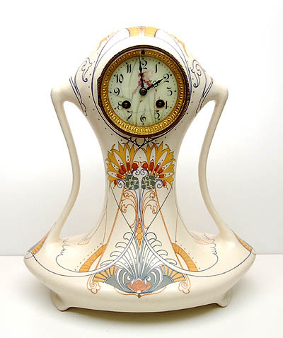 Earthenware mantleclock with enamelled dial and Jugendstil decoration Modelno.82 design Klaas Vet executed by Fayencefabriek Arnhem / the Netherlands 1903-'15 painted by H.P.M.Intres 