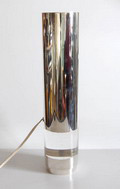 Chromium plated lamp with plastic piece in the middle executed by Christofle / France ca.1970 
