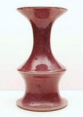  Unica vaas gedraaide vaasvorm steengoed met aubergine glazuur ontwerp uitvoering Jan van der Vaart 1980 
