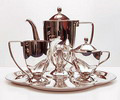 Silver plated hotel quality coffeeservice with original tray executed by Hollandia Plate Hilversum / the Netherlands ca.1930 Sizes Tray long 35 cm wide 30 cm Creamer height 12,5 cm Sugarbasin height 12,5 cm Coffeepot height 24 cm 