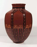 Vase model 269 eight-sided painted with stylized flowers and leaves in black and ochre on brown underground design Bert Nienhuis ca.1905 executed by de Distel Amsterdam / the Netherlands 