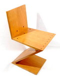 Limbahouten zig-zag stoel ontwerp Gerrit Rietveld 1934 uitgevoerd door Dhr.van Vuuren assistent meubelafdeling Rietveld Academie onder de supervisie van Jan Rietveld 1919-1986 ca.1982 Dertien van deze stoelen werden in opdracht gemaakt voor de Raad van Directeuren van de Rietveld Academie Tien stoelen werden daar geplaatst en staan daar nog steeds Drie stoelen werden aan Dhr.van Vuuren gegeven deze stoel is er één van Met certificaat die herkomst bevestigd 