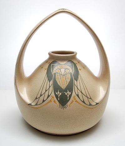  Earthenware vase with handle with stylished decoration of owl in green and ochre against mat-white glazed fond design Bert Nienhuis ca.1903 executed by de Distel / the Netherlands 