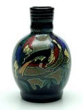  Earthenware vase model no.9 with polychrome floral decoration and bird design W.H.van Norden ca.1920 executed by Eskaf Steenwijk / the Netherlands 