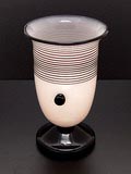  Opaque white glass vase with black applied stand three knobs and glasswire design attributed to Michael Powolny ca.1916 executed by Joh Loetz Witwe Klostermühle / Bohemia 