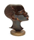  Gegoten bronzen Afrikaans hoofd gemonteerd op messing voet ontwerp uitvoering onbekend ca.1935 