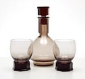  Whisky-carafe grey-violet with facet-cut stopper two beakers with facet-cut stands design A.D.Copier 1927 executed by Leerdam / the Netherlands 