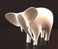  Gestileerd porseleinen beeldje van Olifant ontwerp Jaroslav Jezek 1960 uitvoering Royal Dux Bohemen 