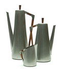  Pewter mocha- and coffeepot with a milkjug all with wooden handles / knobs design unknown executed by Fa Daalderop Tiel / the Netherlands ca.1965 Heights 31 23,2 13,6 cm 