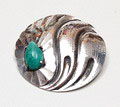  Silver hammered brooch with drop-shaped green gem design executed by A.Meyer Schoonhoven / the Netherlands ca.1930 