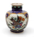  Aardewerk Juliana vaasje met polychrome decoratie van vogel uitvoering Plateelbakkerij Rozenburg / Den Haag 1914 