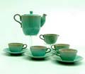 Light-green glazed earthenware teaset teapot milkjug and 4 cups  saucers design  executed by  Pieter Groeneveldt  Voorschoten / the Netherlands ca.1935 