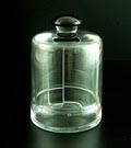 Helderglazen beschuitbus met gleuf deksel met zwarte knop ontwerp A.D.Copier 1934 uitvoering Glasfabriek Leerdam 
