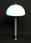 Staande metalen lamp met transparante perspex schijven en witte perspex kap uitvoering Raak / Amsterdam ca.1970 