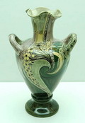 Platelen Faïence de Purmerende oorvaas met florale decoratie uitvoering Wed.Brantjes 1895-1904 