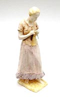  In pasteltinten geglazuurd aardewerk beeld van Breiende Vrouw model.no 478 ontwerp A.F.H.Falise 1904-'07 uitvoering Plateelbakkerij Haga Purmerend / Holland 