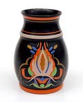 Aardewerk vaasje met polychrome florale koudlak decoratie ontwerp uitvoering mogelijk Ed Antheunis of Plateelbakkerij P van der Want Gz Gouda ca.1930 