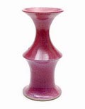 Gedraaide steengoed Unicum vaas met lila-roze halfmat glazuur ontwerp uitvoering Jan van der Vaart 1979 in eigen atelier 