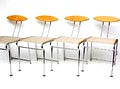 Metalen stoelen 4x met spaghetti zitting en houten rugleuning van de Dinamic Collection ontwerp Massimo Iosa Ghini 1986 uitvoering Moroso / Italië 