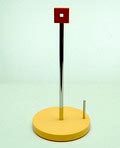 Geel kunststof keukenpapier-houder met oranje grip Euclid ontwerp Michael Graves 1994 uitvoering Alessi / Italië 