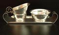 Verzilverd art-deco melkkannetje suikerbakje op rechthoekig blaadje ontwerp Georg Nilsson ca.1935 uitvoering Gero 