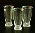 Drie limonadebekers van servies D ontwerp K.P.C.de Bazel 1917 uitvoering Glasfabriek Leerdam 