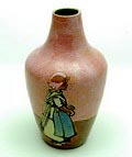 Aardewerk vaas met decoratie van Meisje in klederdracht ontwerp Cornelis de Bruin of Jan van der Vet 1903-'08 uitvoering Dordtsche Kunstpotterij D.K.P 