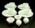  Delen van servies Le petit café uit de serie Fantasia “ vier kop en schotels twee eierdopjes peper en zout stel ontwerp Matteo Thun 1987 uitvoering Porzellanfabrik Arzberg / Duitsland 1988 