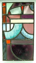  Vitrica glas-in-loodraam opgebouwd uit ruitjes met tincraquelé wit en antimooncraquelé zwart op blauw paars lila groen rood en oranje glas ontwerp A.D.Copier ca.1928 uitvoering Glasfabriek Leerdam 