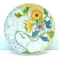 Grote wandschotel met polychrome florale decoratie uitvoering Zuid-Holland / Gouda ca.1907 