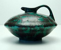 So called discus-jug with green spickled glaze design  W.H.van Norden  ca.1930 executed by  Eskaf  the Netherlands  