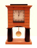  Wooden and plastic electric mantle clock design Michael Graves 1988 executed by Alessi / Italy 
